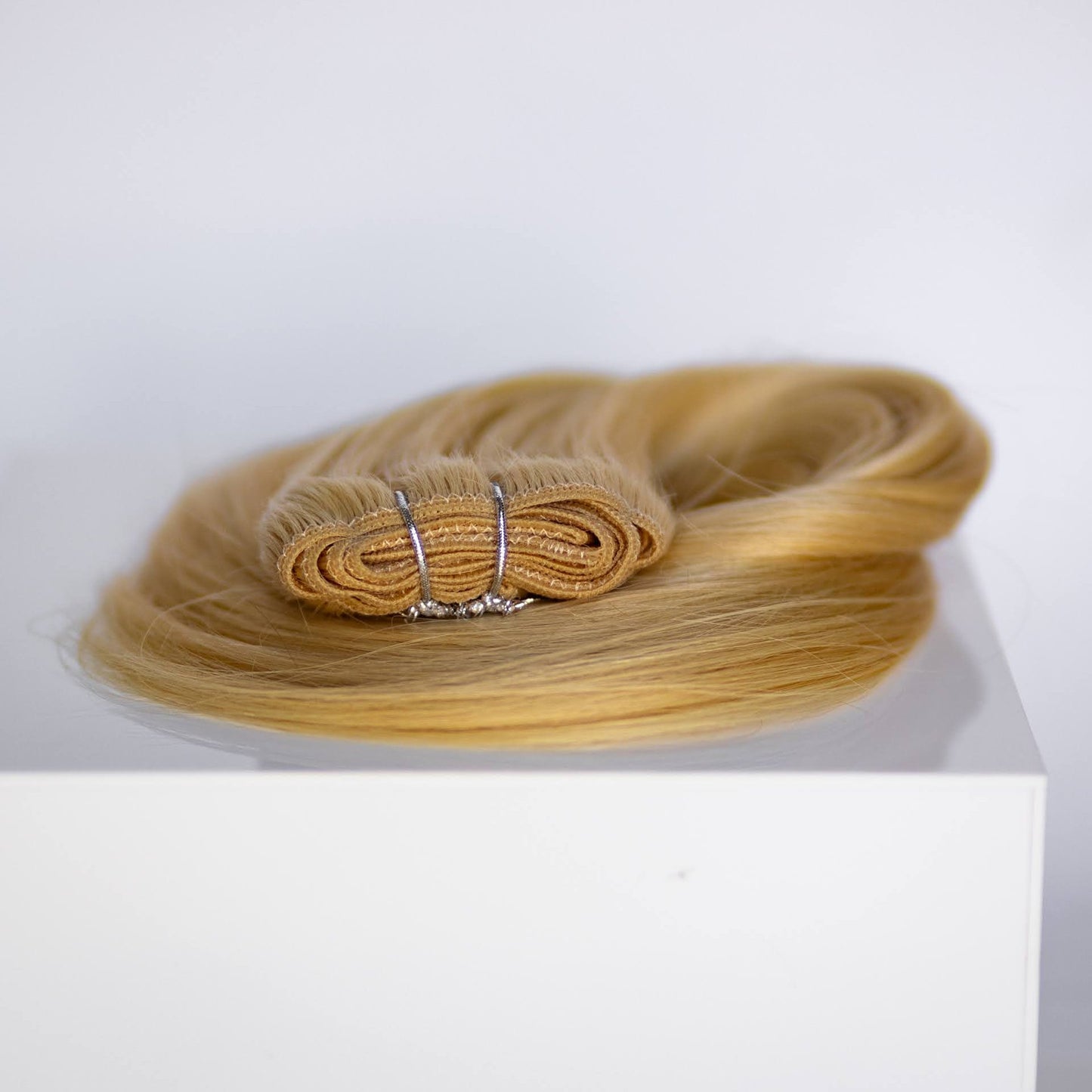 Machine-Tied Weft 22" 160g Professional Hair Extensions - #22 Southern Belle Blonde (aka Light Ash Blonde)