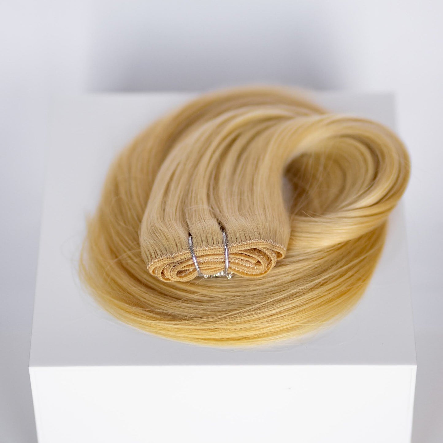 Machine-Tied Weft 22" 160g Professional Hair Extensions - #22 Southern Belle Blonde (aka Light Ash Blonde)