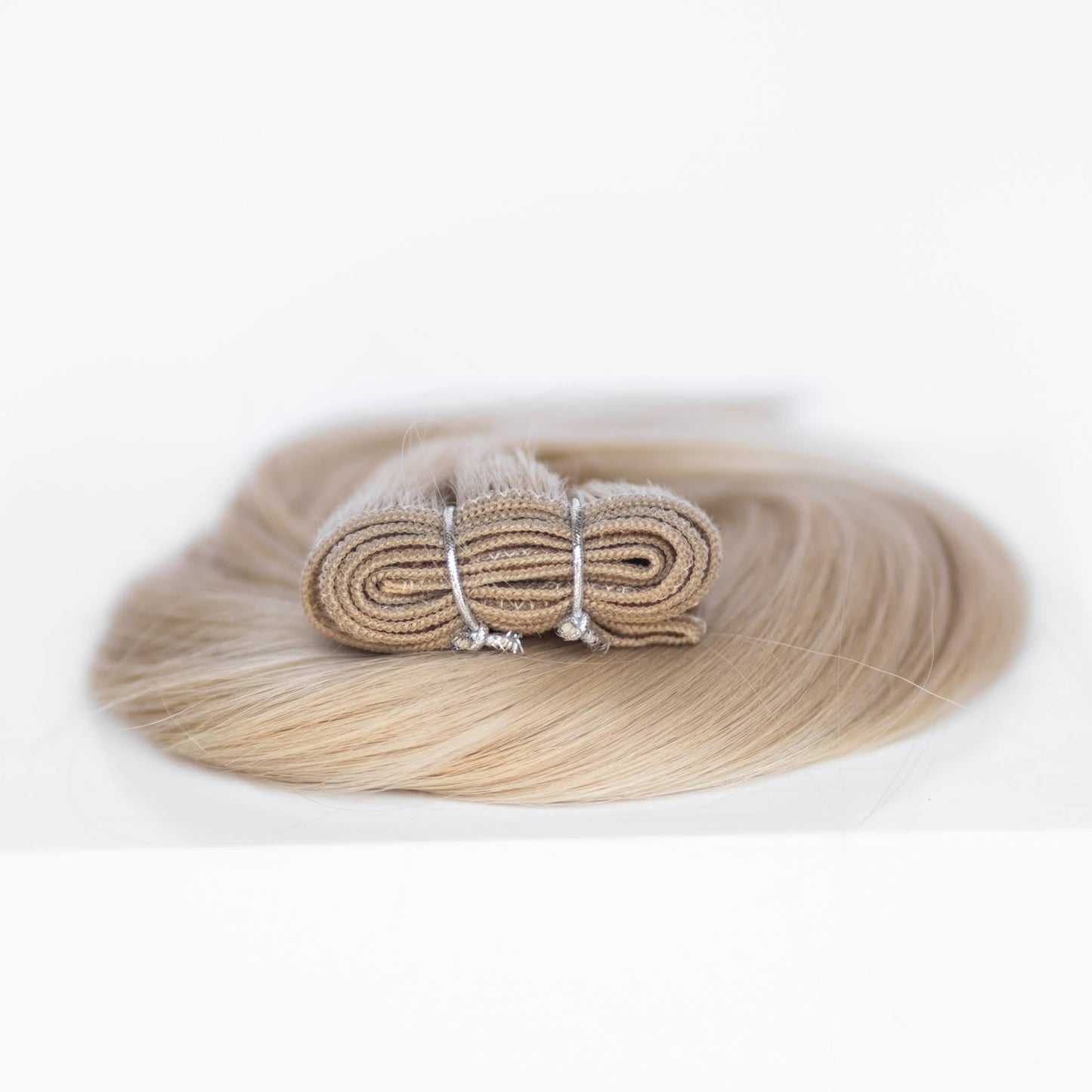 Machine-Tied Weft 24" 170g Single Donor Virgin - #16 Paris Blonde (aka Vanilla Blonde)